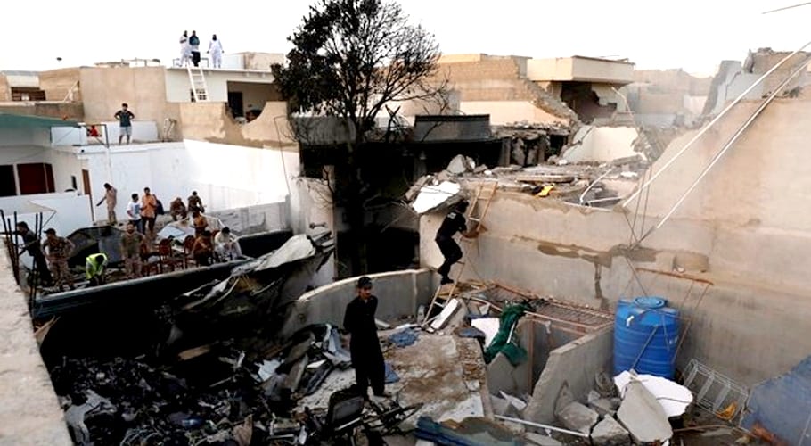 PIA special team inspects plane crash site