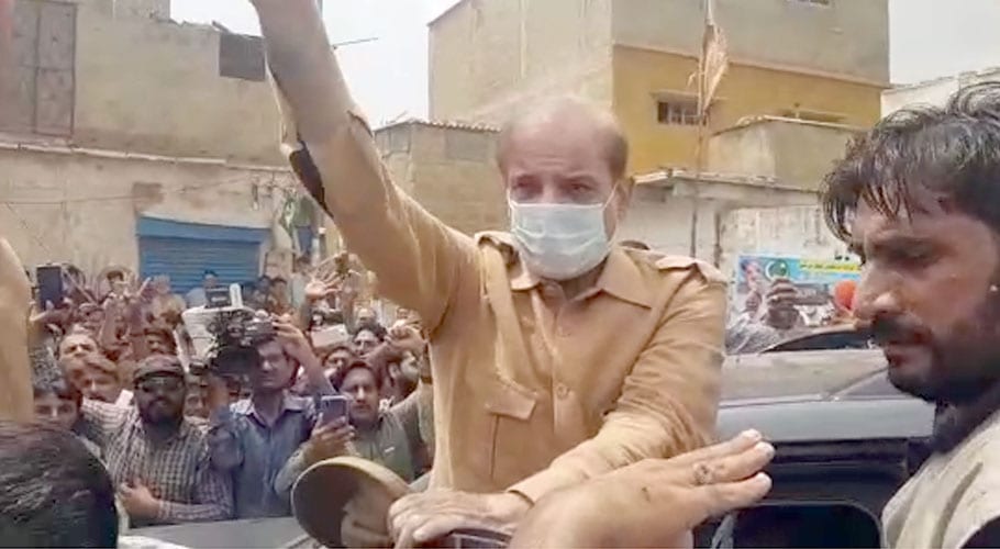 Shehbaz Sharif meets rain-hit victims in Karachi