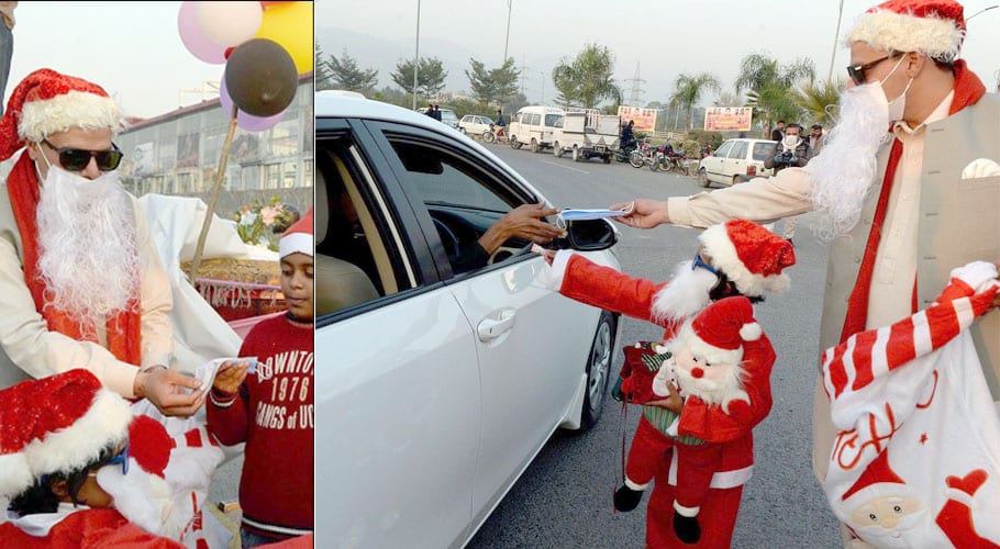 Santa Claus distributing gifts in Pakistan