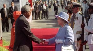 South Africa’s President Nelson Mandela greets Queen Elizabeth in Cape Town at the official start of her first visit to the country since 1947. (1993)