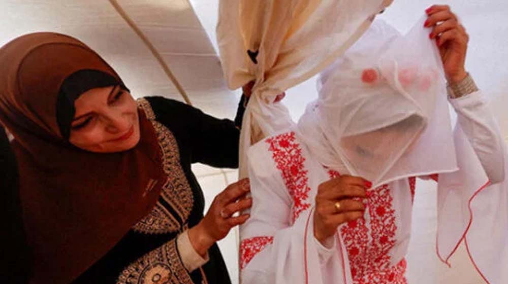 پناہ گزین کیمپ میں فلسطینی جوڑے کی شادی