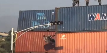 Protester praying on container thrown down by security forces: Watch video