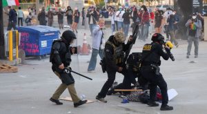 LA police order immigration protesters in downtown to go home