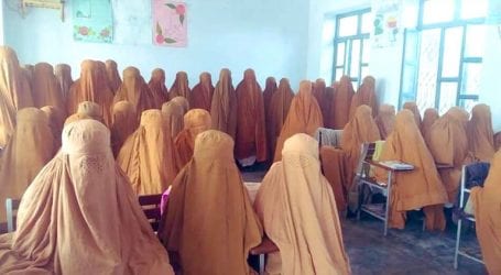 Burqas distributed at govt school in Mardan