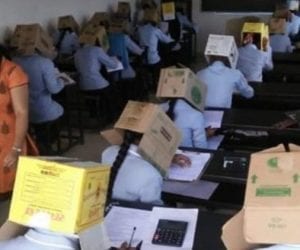Indian students forced to wear cartons to prevent cheating during exams