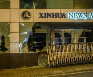 China slams Hong Kong attack on state media office