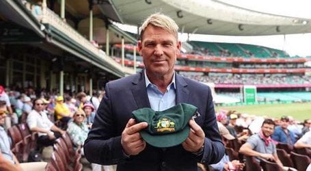 Warne’s baggy green cap sale raises Aus$1m for fire victims