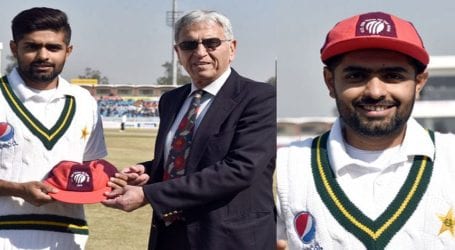 Babar Azam receives his ICC ODI team of 2019 cap from Majid Khan