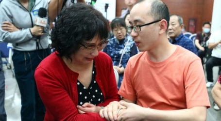 Chinese parents reunited with son abducted 32 years ago