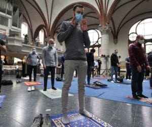 Muslims pray in Berlin church to comply with social distancing rules