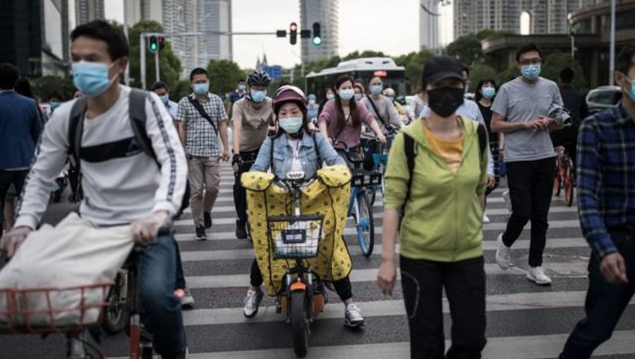 Wuhan to test entire population after new virus clusters