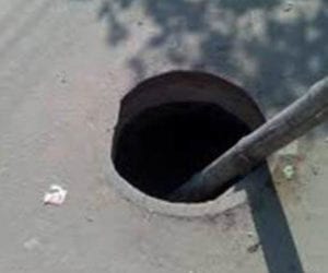 Child drowns after falling into open manhole
