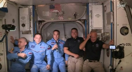 NASA astronauts reach space station in milestone mission
