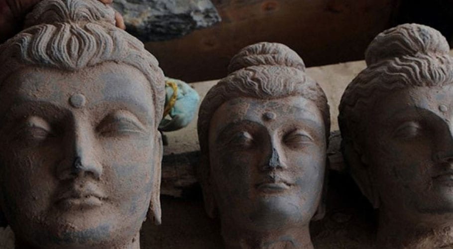 Four held in KP for destroying ancient Buddha statue