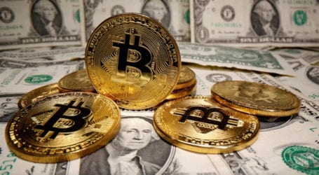 Bitcoin hits $1 trillion market value to all-time peak