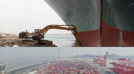 Maritime traffic jam grows outside blocked Suez Canal, restoration effort continues