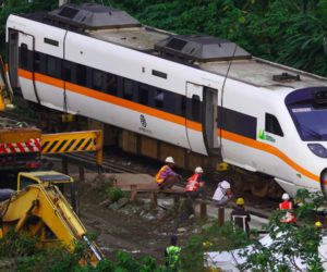 Taiwan seek arrest warrant for suspect in deadly train crash