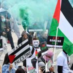 Pro-Palestinian demonstrators attend a protest following a flare-up of Israeli-Palestinian violence, in London. Source: Reuters.