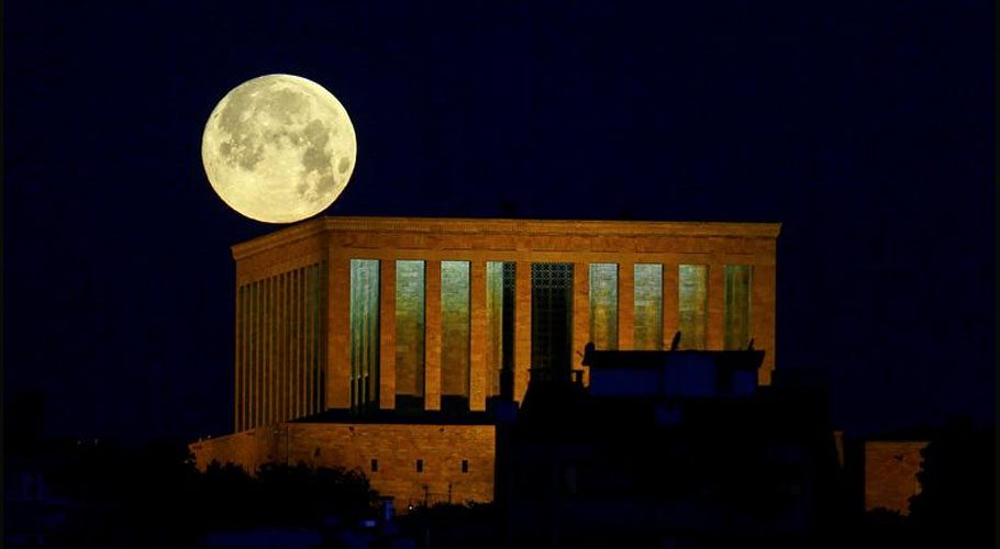The full moon, known as the "Super Flower Moon", is seen over the Anitkabir, the mausoleum of modern Turkey's founder Mustafa Kemal Ataturk, in Ankara, Turkey. Source: Reuters 