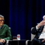 Warren Buffett, chairman and CEO of Berkshire Hathaway, speaks while Bill Gates looks on. Source: Reuters