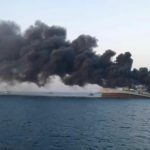 Smoke rises from Iran navy’s largest ship in Jask port in the Gulf. Source: Reuters.