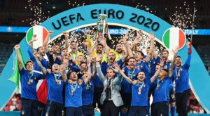 Italy celebrate with the trophy after winning Euro 2020 . Source: Reuters