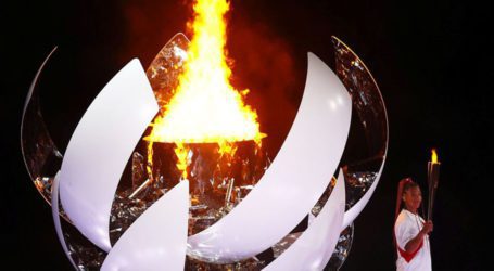 Tennis star Osaka lights flame as COVID-hit Tokyo Olympics open
