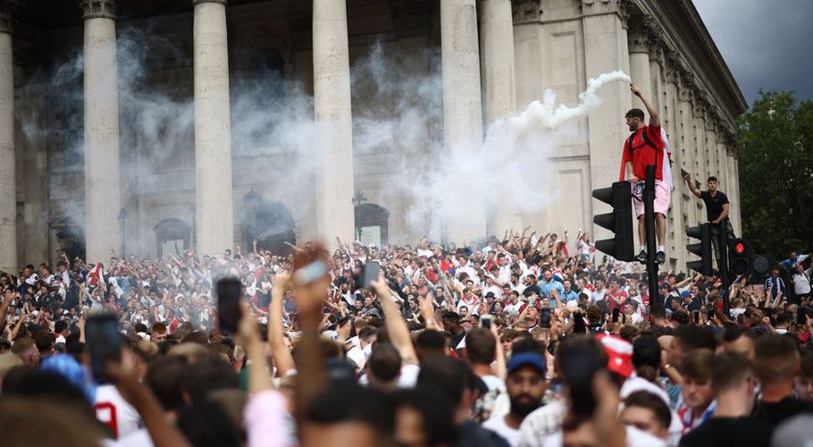 England fans with flares gather in Trafalgar Square ahead of the match. Source: Reuters