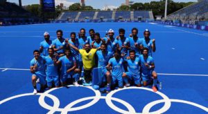 Players of India pose for a group photo after winning the match for bronze. Source: Reuters.