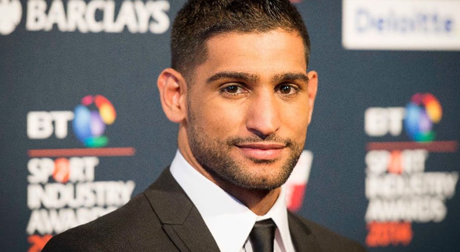Amir Khan said he had been taken off the American Airlines plane. Source: CNBC
