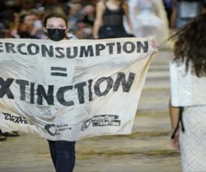 Protestor disrupts Luis Vuitton’s fashion show in Paris