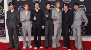 Pop group BTS at the red carpet of fan-voted American Music Awards 2021 (Footwear News)