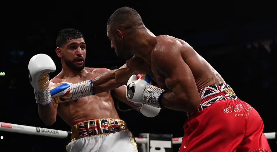 The referee stepped in Amir Khan still standing and Brook piling in a barrage of one-sided punches. Source: Daily Mail.
