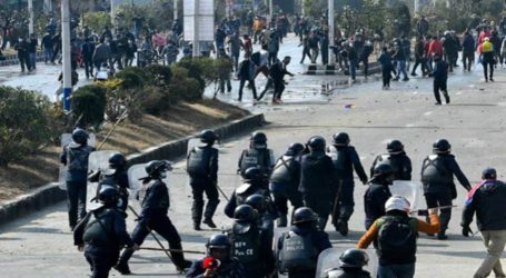 Nepal police fire tear gas as MPs debate US grant