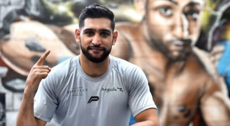 Former world champion Amir Khan retires from professional boxing