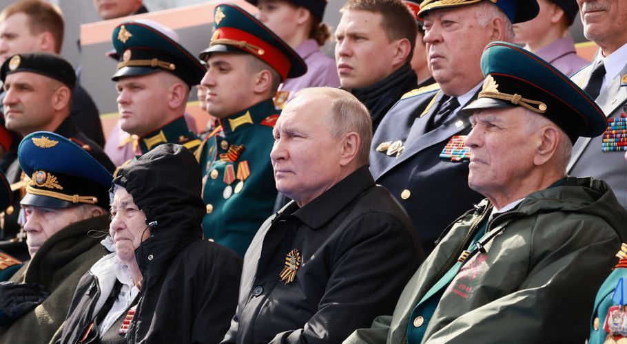 Russian President Vladimir Putin watches a military parade on Victory Day. Source: Reuters.