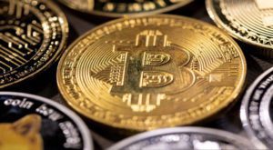 Bitcoin surges to record high