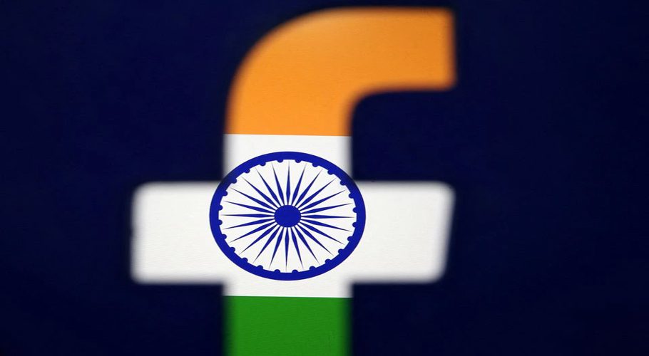 India's flag is seen through a 3D printed Facebook logo in this illustration picture, April 8, 2019. REUTERS/Dado Ruvic/Illustration