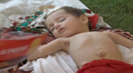 Eight-month-old orphan Husna is battling diarrhea in Charsadda flood relief camp