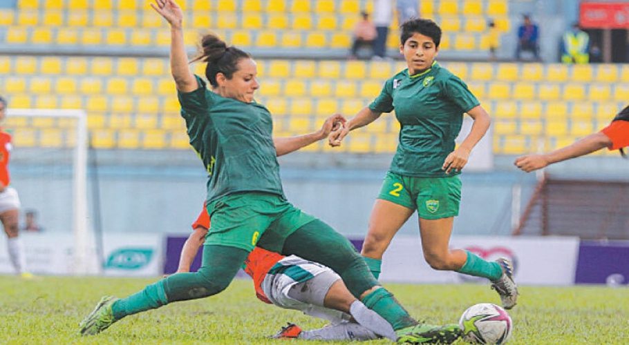 Pakistan captain Maria Jamila Khan competes for the ball during the SAFF Women’s Championship match against Bangladesh at the Dasharath Rangasala Stadium on Saturday. (Image: SAFF)