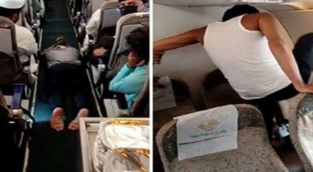 Video of passenger trying to break plane’s cabin window goes viral