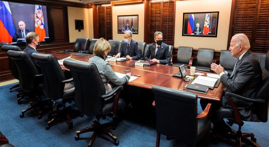 U.S. President Joe Biden holds virtual talks with Russia's President Vladimir Putin amid Western fears that Moscow plans to attack Ukraine, as Secretary of State Antony Blinken listens with other officials during a secure video call from the Situation Room at the White House in Washington, U.S., December 7, 2021. The White House/Handout via REUTERS