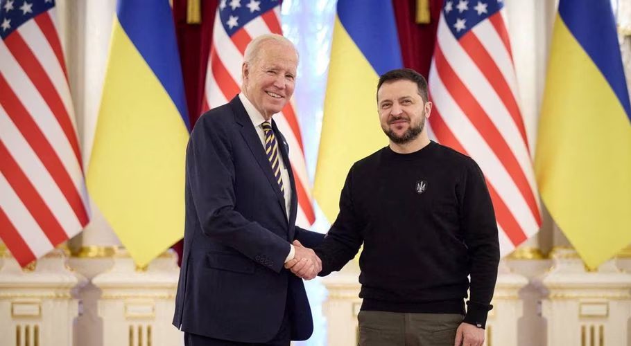 Ukraine's President Volodymyr Zelenskiy and U.S. President Joe Biden shake hands before a meeting, amid Russia's attack on Ukraine, in Kyiv, Ukraine February 20, 2023. Ukrainian Presidential Press Service/Handout via REUTERS