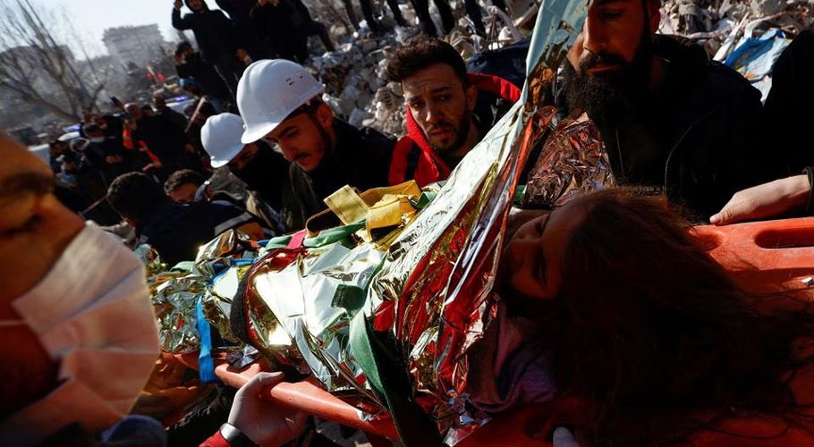 Rescuers carry Aisha, a 5-year-old Syrian girl, who survived a deadly earthquake in Kahramanmaras, Turkey February 11, 2023. REUTERS/Guglielmo Mangiapane