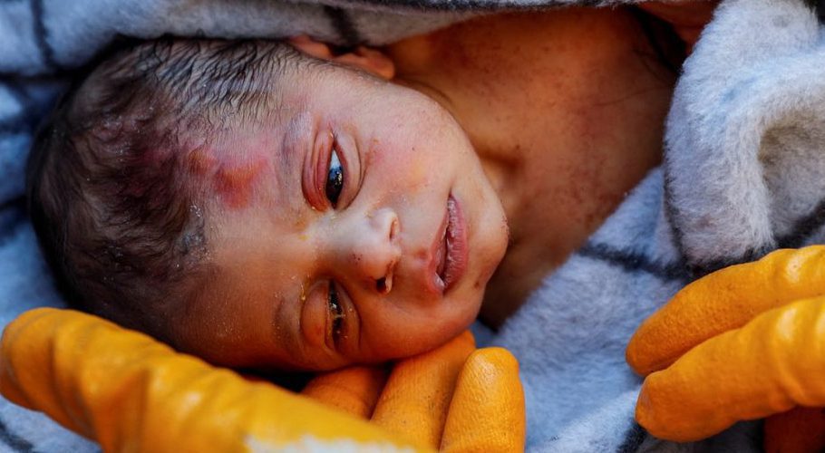 A rescuer holds baby boy Kerem Agirtas, a 20-day-old survivor who was pulled from under the rubble, in the aftermath of a deadly earthquake in Hatay, Turkey, February 8, 2023. REUTERS/Kemal Aslan