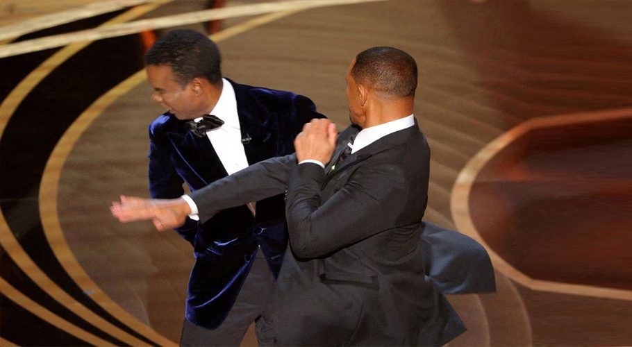 Will Smith hits Chris Rock onstage during the 94th Academy Awards in Hollywood, Los Angeles, California, U.S., March 27, 2022. REUTERS/Brian Snyder/File Photo