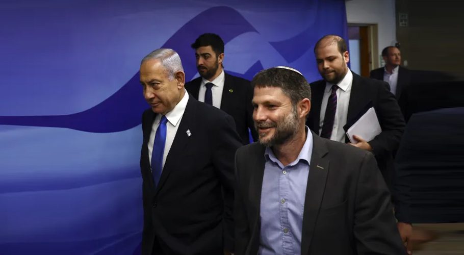 FILE - Israeli Prime Minister Benjamin Netanyahu, left, and Finance Minister Bezalel Smotrich, right, arrive to attend a cabinet meeting at the Prime Minister's office in Jerusalem, Feb. 23, 2023. 
(Ronen Zvulun/Pool Photo via AP, File)