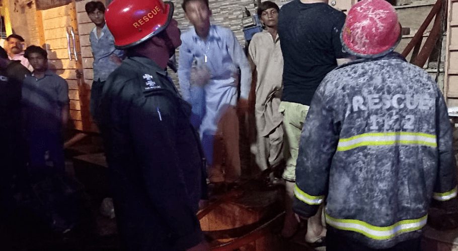 Rescue efforts are under way after a fire erupts on the second floor of a building in Mohalla Samian in Lahore’s Walled City in the early hours of Wednesday, killing 10. — (Image. Dawn.com)
