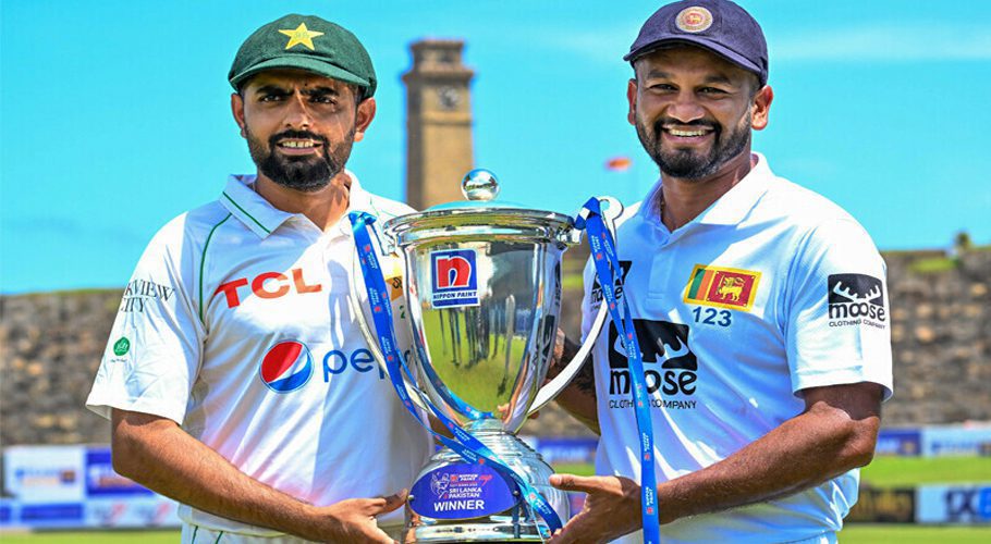 Sri Lanka’s captain Dimuth Karunaratne (R) and Pakistan’s captain Babar Azam pose with the Test trophy at the Galle International Cricket Stadium in Galle on July 15, 2023, ahead of their two Tests cricket matches between Sri Lanka and Pakistan. — AFP