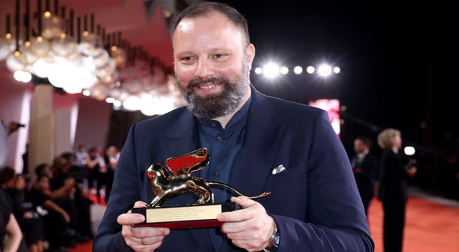 Poor Things’ director Yorgos Lanthimos poses with Venice’s Golden Lion award. Photograph: Pascal Le Segretain/Getty Images